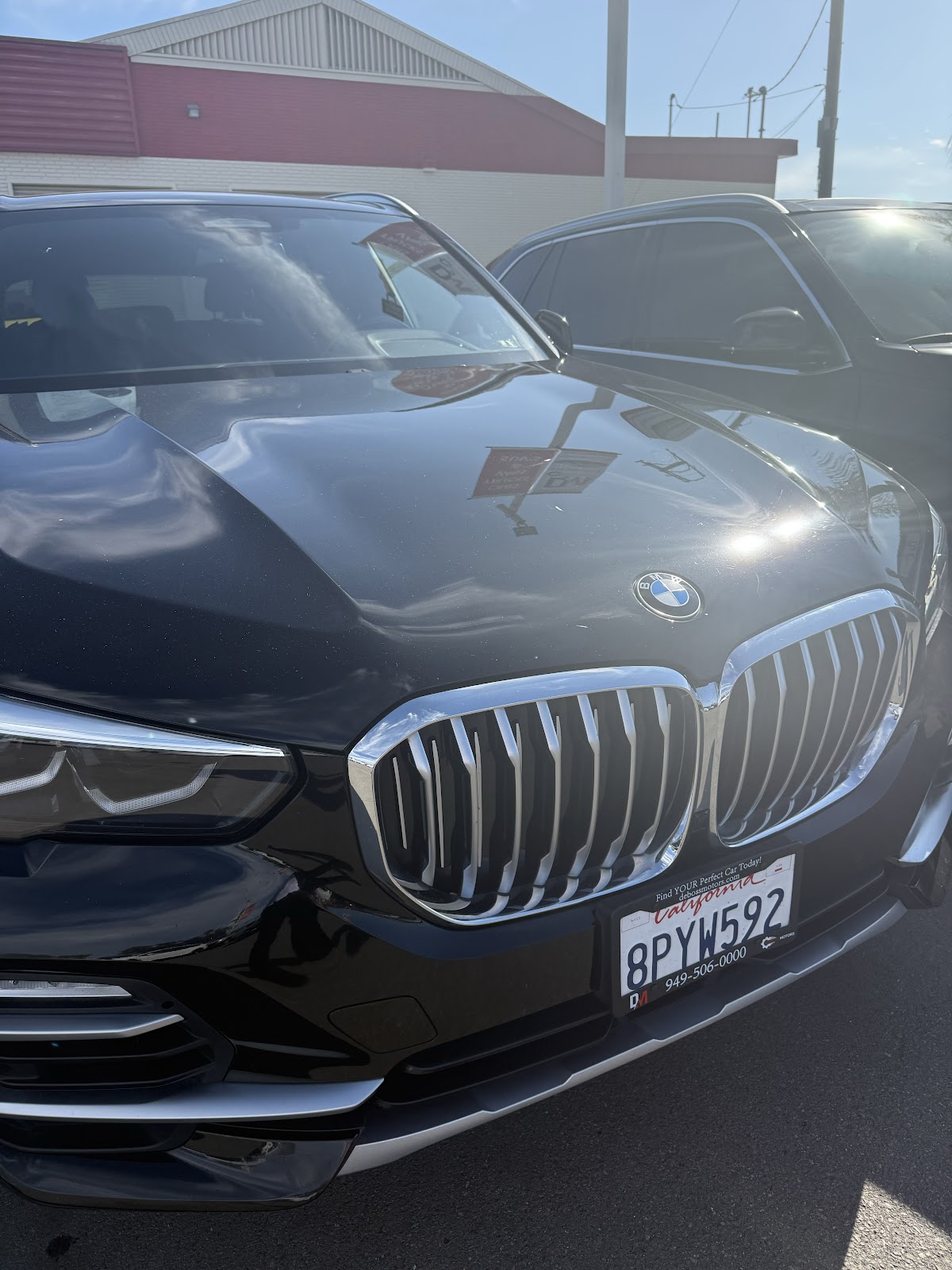 A car being worked on at HN Auto Repair